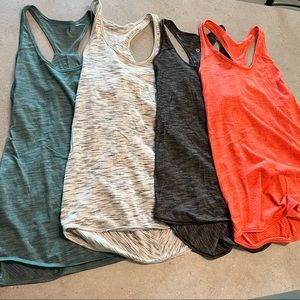 4 Lululemon Essential Tanks, size 6